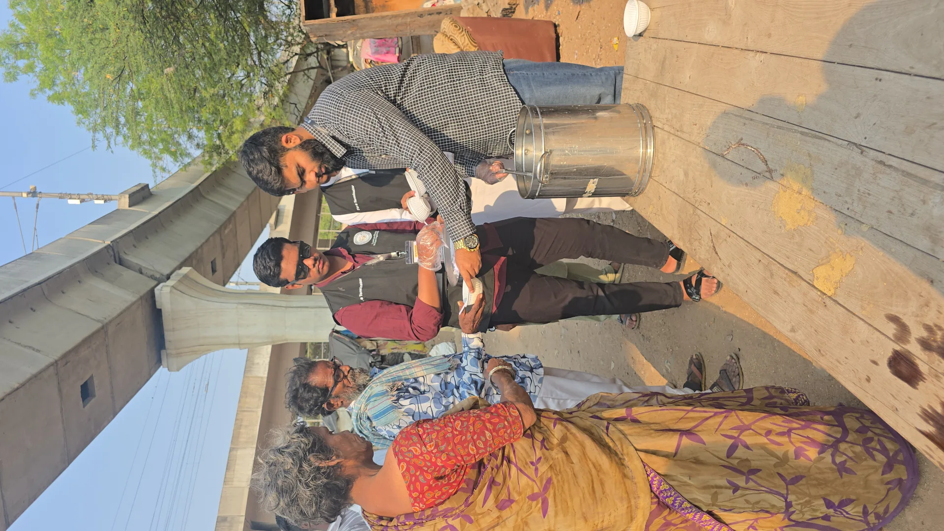 Volunteer serving food during a relief drive