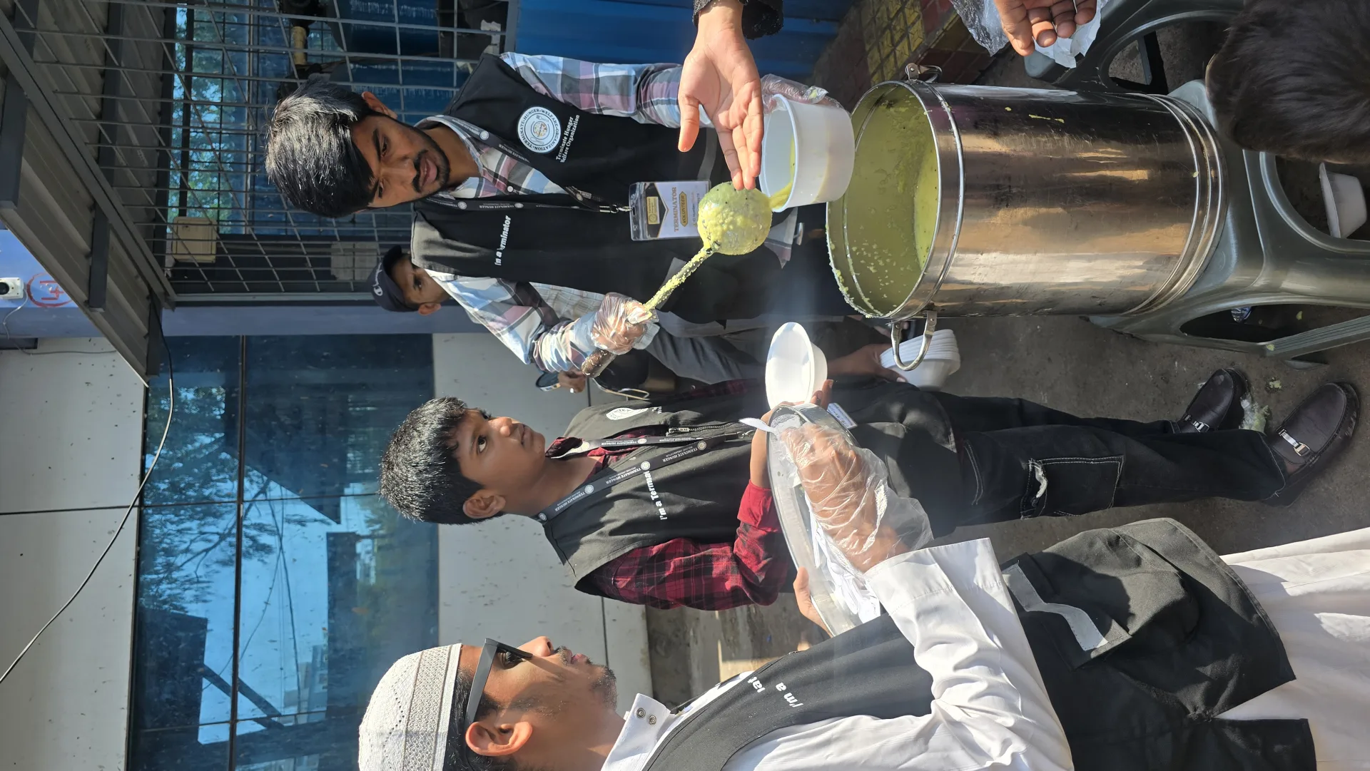 Volunteers serving a morning meal